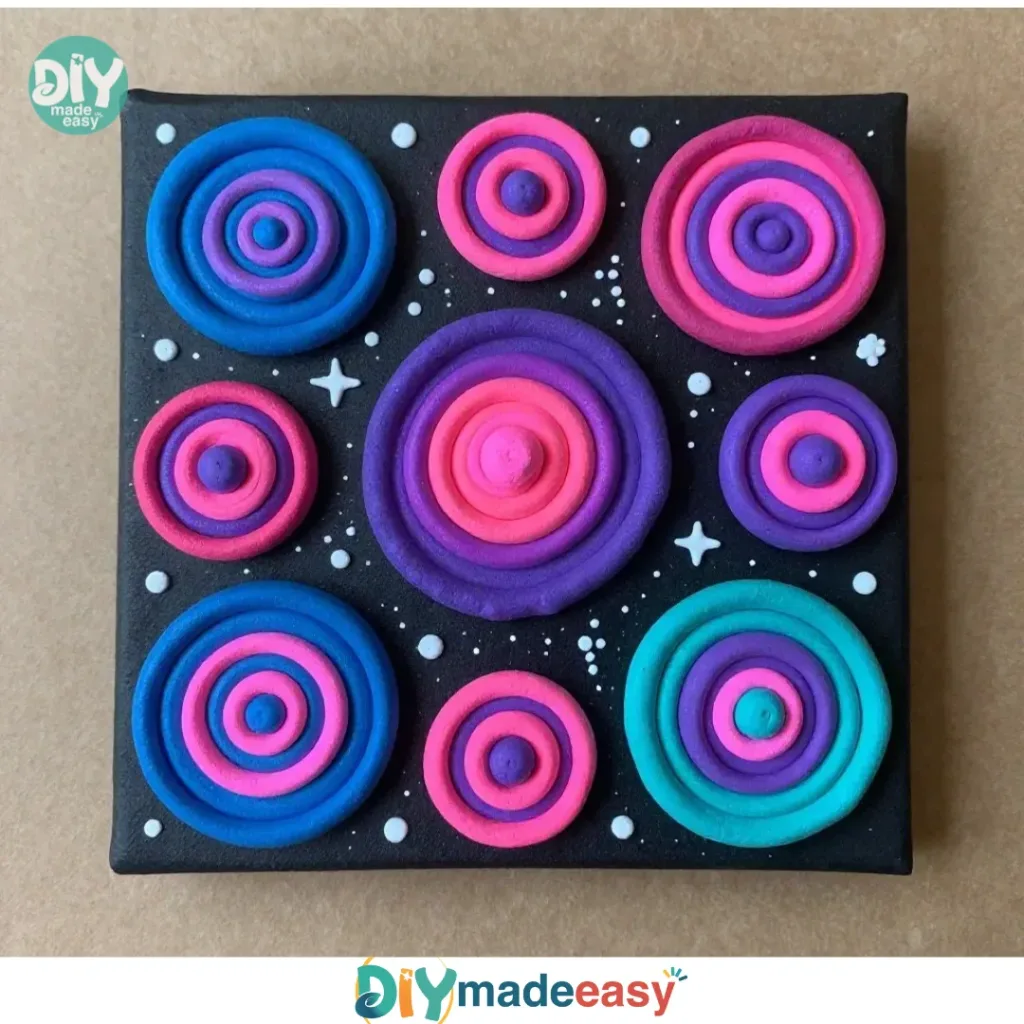 Puffy paint galaxy craft showcasing vibrant colors and 3D texture.