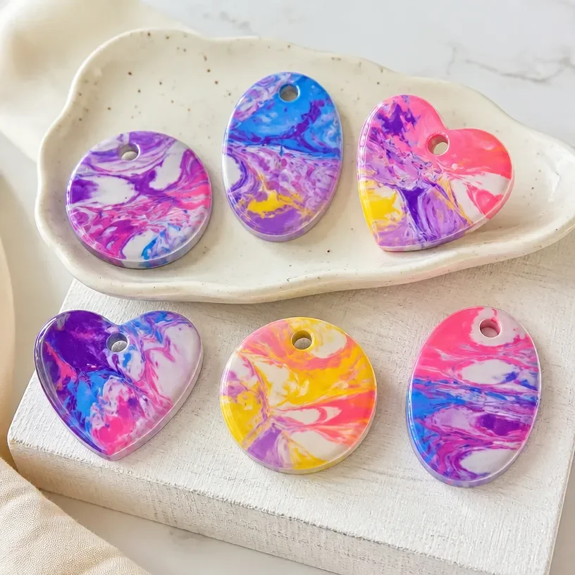 DIY nail polish marble design tutorial with colorful swirls